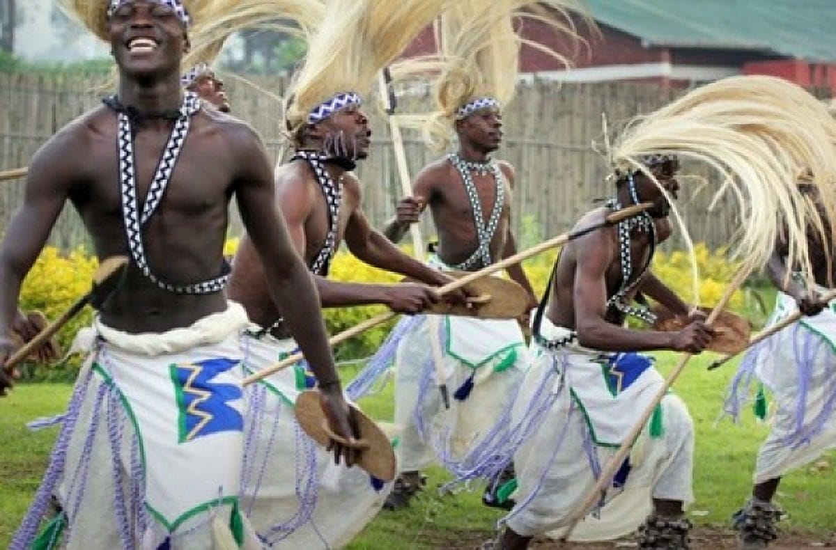 Vibrant traditional tribal dance performance and cultural heritage celebration in Uganda managed by Aamam Safaris